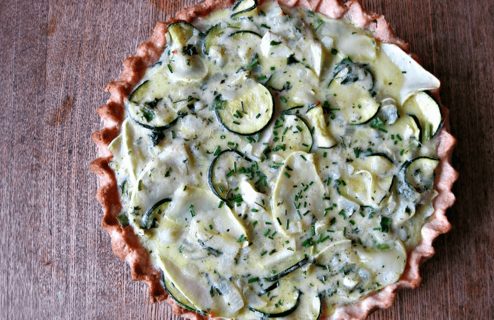 This zucchini squash pie is perfect for summer and the simple crust is made from scratch, right in the pan!