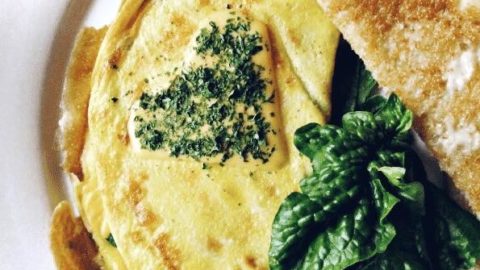 Omelette made with fresh lump crab meat, cheese and spinach. Served with buttered toast.
