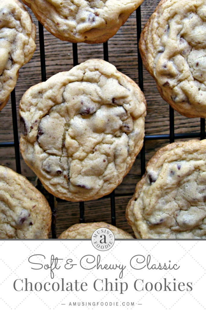 Soft and chewy classic chocolate chip cookies on a baking rack.