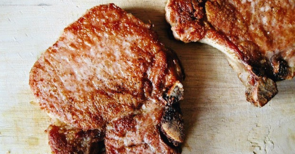 Juicy skillet fried thick-cut pork chops are a favorite in our house. Easy for a busy weeknight, and fall-off-the-bone tender!