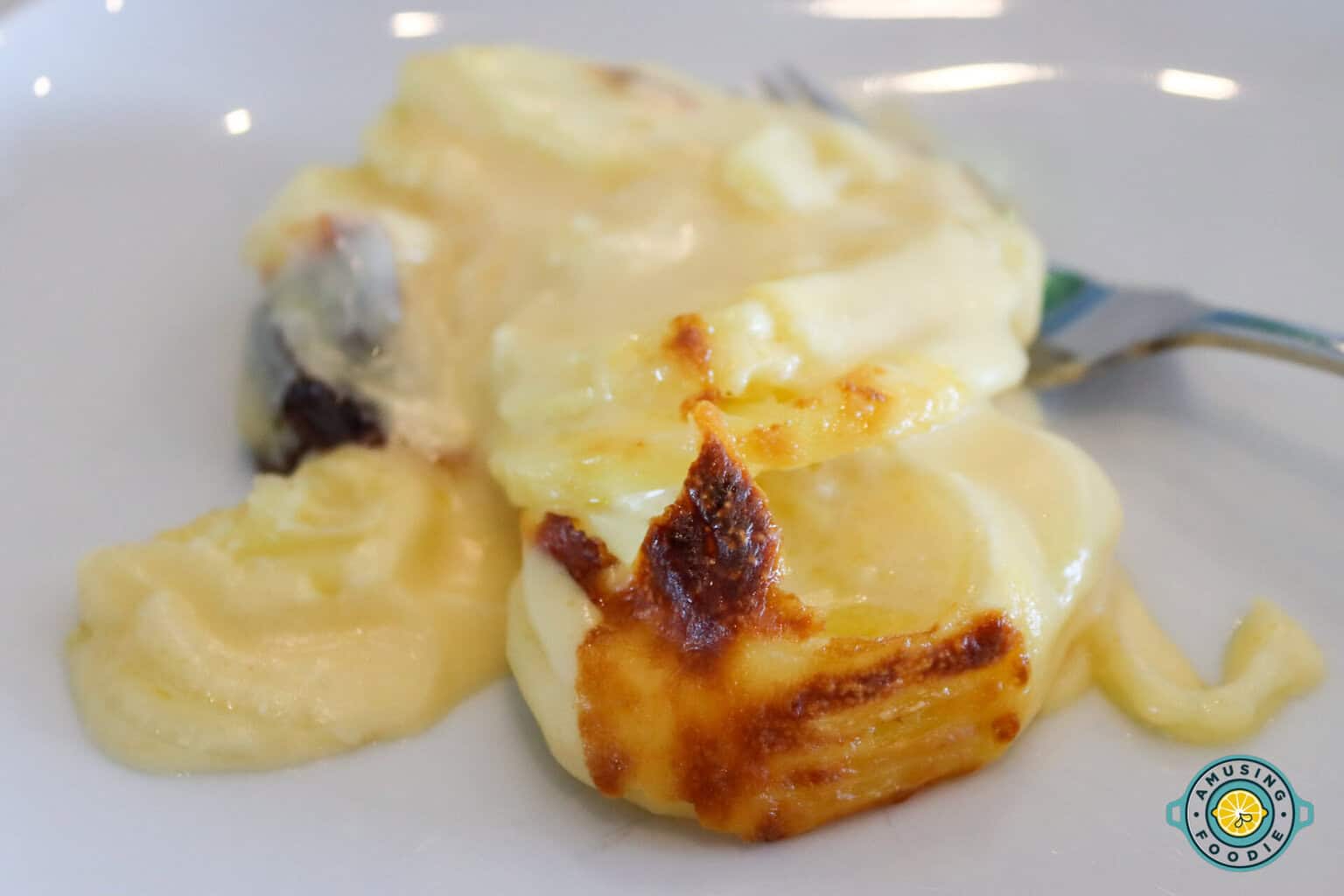 creamy scalloped potatoes on plate 2