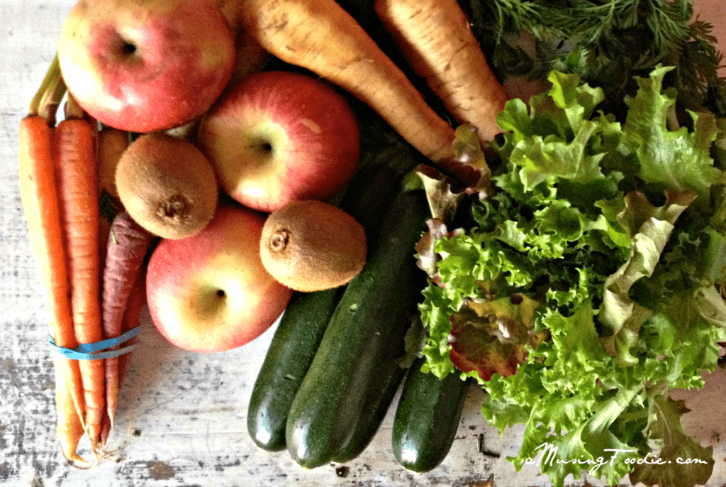 Zucchini, apples, carrots, kiwi, parsnips and lettuce from a local CSA