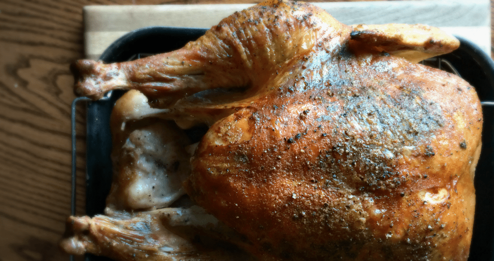 Glistening roasted turkey, perfect for holiday feasts and family gatherings.