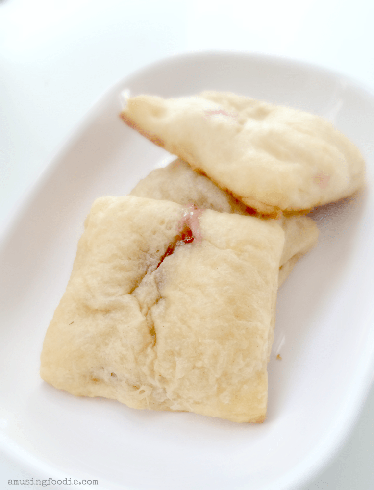 There's nothing better than having a fabulously simple and delicious appetizer in your back pocket. These savory and sweet brie and raspberry crescent roll bites are made with three ingredients, in under thirty minutes.