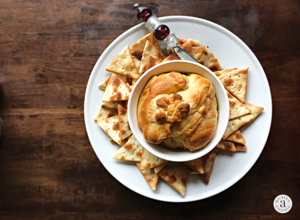 This mouth-watering ooey-gooey baked brie with RO*TEL is a fun and festive appetizer that's perfect for holidays and entertaining!
