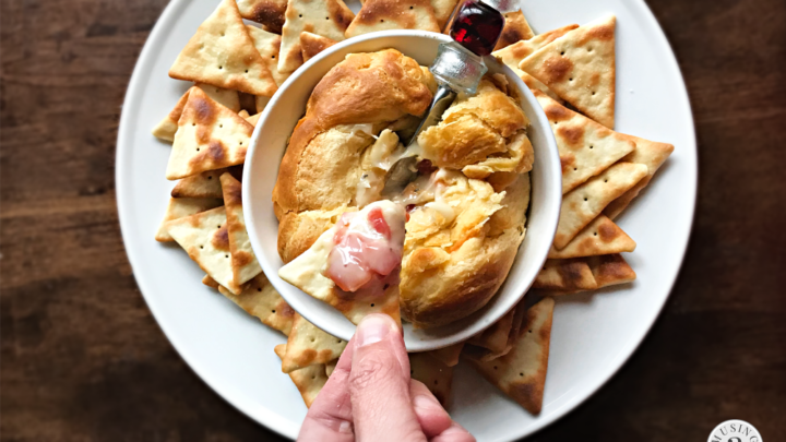 This mouth-watering ooey-gooey baked brie with RO*TEL is a fun and festive appetizer that's perfect for holidays and entertaining!