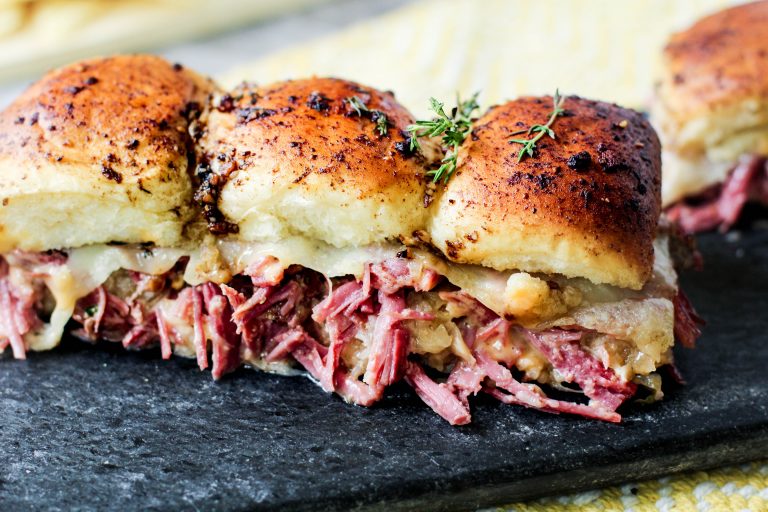 Even though most folks think about corned beef recipes in March thanks to St. Patrick's Day, corned beef makes for a yummy meal any time of the year! Try these Reuben sandwich sliders!
