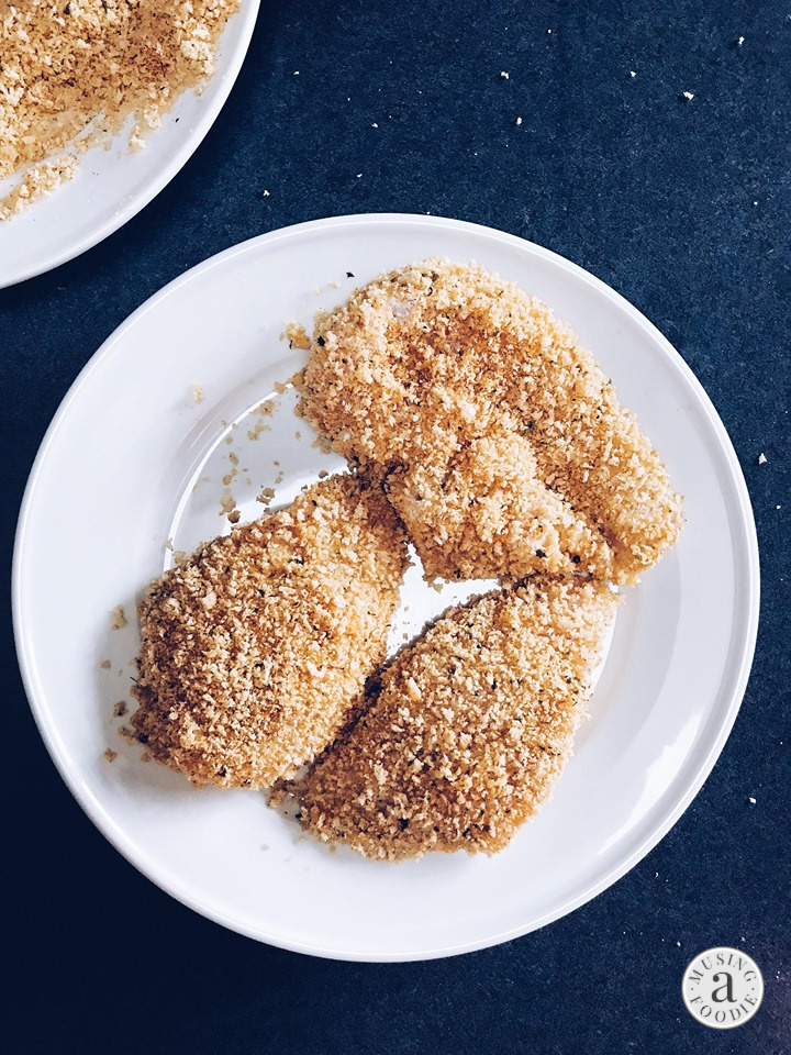 Panko crusted chicken ready to be seared.